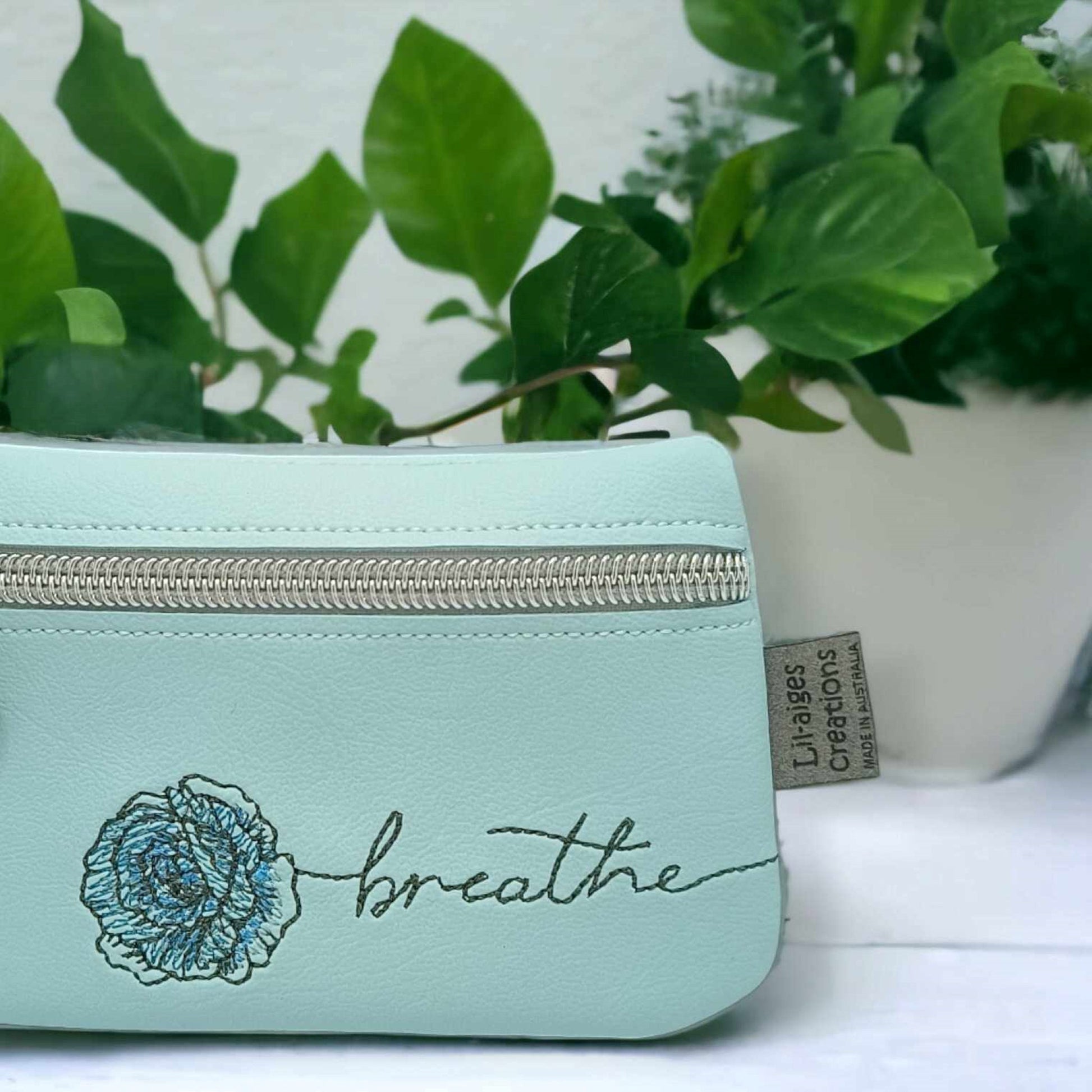 Light Blue Zipper Coin Purse with Breathe Rose Design, made in Australia